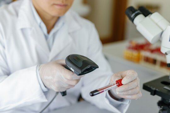 Medical researcher test tube blood healthcare control gadget 