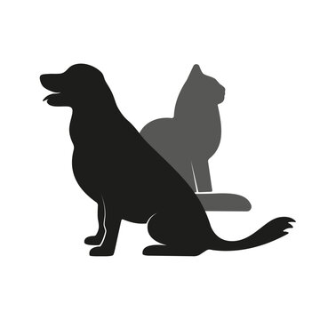 Silhouettes of a dog and a cat sitting side by side and looking in different directions. Flat design style. Vector illustration.