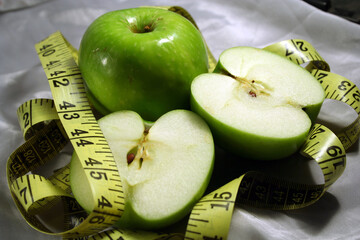 apples fruits & measuring tape