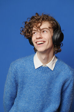 Blue Isolated. Gen Z. Headphones. Music lover. Upbeat