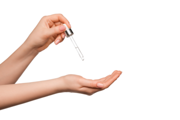 Hands of a beautiful woman dripping serum collagen. Female hands isolate.