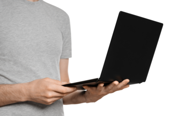 Silhouette of a man in gray clothes holds a laptop in his hands, isolate on a white background.