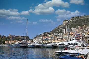 Fototapeta na wymiar Port with yachts and Prince's Palace of Monaco skyline