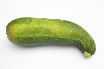 On a photo a vegetable marrow. The photo is isolated