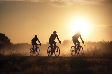 Obraz premium Silhouettes of professional cyclists training on road bikes at sunset. Active outdoor sports. Cycling trip. Created with Generative AI