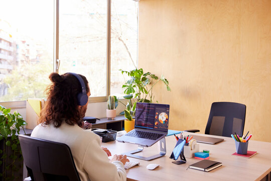Unrecognizable male designer creating project in office