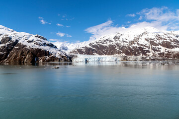 Fototapeta na wymiar Margerie Glacier is a 21 mi long tidewater glacier in Glacier Bay, Alaska, United States within the boundaries of Glacier Bay National Park and Preserve. 