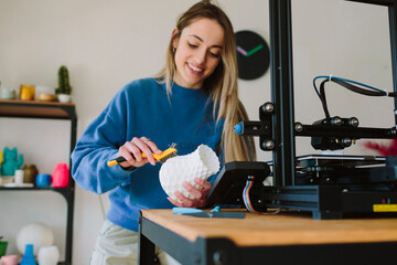 Smiling woman doing crafts