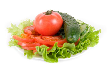 Healthy combination of lettuce, tomato and cucumber on white
