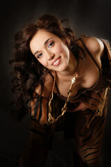 Portrait of the beautiful brunette in studio