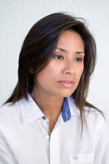 Asian woman wears white shirt