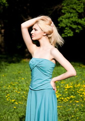 Fototapeta premium Beauty Model Close-Up Portrait On The Nature Background