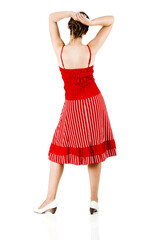 Rear view of a beautiful woman with a red dress