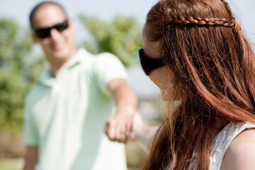 Fototapeta premium Closeup Portrait Of A Cute Couple, Focus On Female