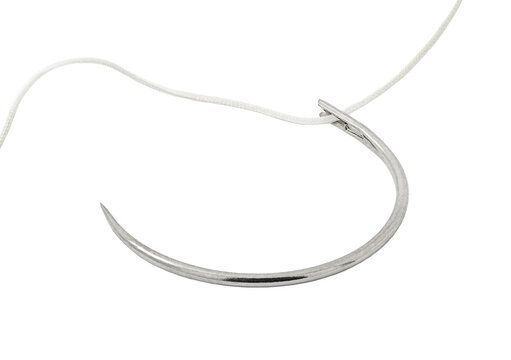 Surgical curved needle with thread close-up, suture material, isolated on transparent background .