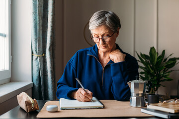 Senior Woman Keeping Her Diary 
