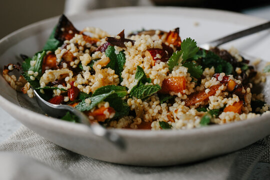 Roasted vegetable and millet salad, with herbs.