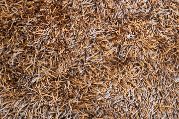 Close up shot of brown modern carpet background
