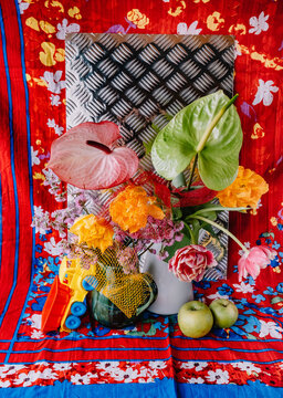 Bouquet in a vase with anthurium and tulips.