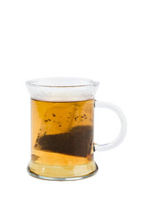 Cup of black tea with tea-bag on white background