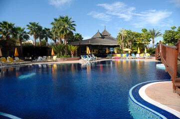 By the pool in the morning.