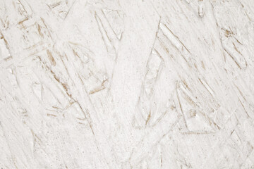 Fiberboard plywood roughly painted with white paint, texture background