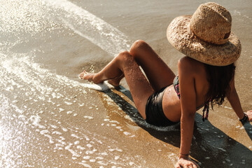 woman enjoying summer at the beach