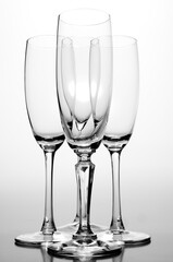 A series of wine plasses ready to be filled.