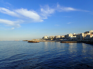 Fototapeta premium Alger the capital city of Algeria, North Africa, city centre of Algiers, the capital of Algeria, Landscape of Algiers city With port and mediterranean sea and white buildings, Arab Maghreb Africa.