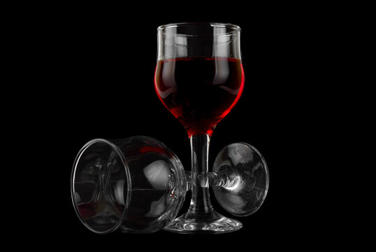glass of wine on a black isolated background