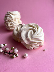 Pink marshmallow on pink background