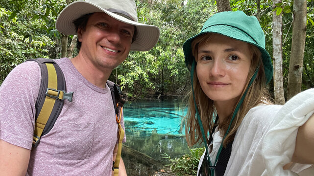 A couple at the Emerald pool in Thailand