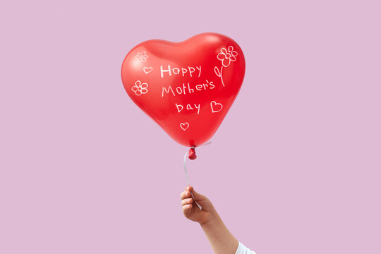 Heart-shaped Happy Mother's day balloon.