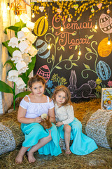 Beautiful girl in white dress standing on bed