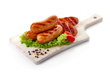 Grilled bratwurst sausages, isolated on white background.