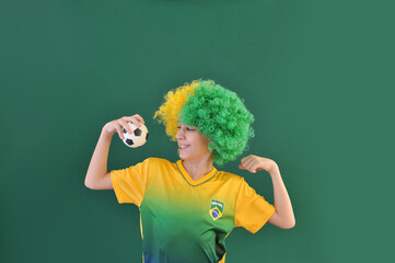 garoto do brasil comemorando gol no futebol  - obrazy, fototapety, plakaty