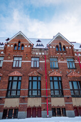 Fototapeta na wymiar Facade view of red brick Bank of Finland building at Market Square, Vyborg, Russia. High quality photo