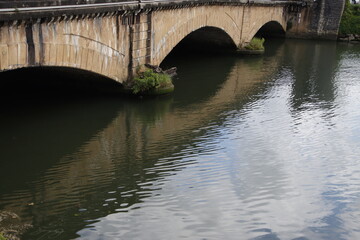 Fototapeta na wymiar old bridge over river