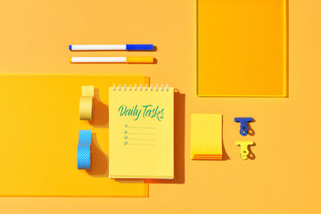 Spiral notebook with handwriting daily tasks 