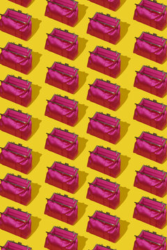 pattern of some empty pink satin purses