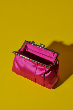empty pink satin purse