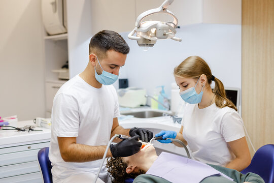 Dental procedure technology specialist heal patient teamwork equipment