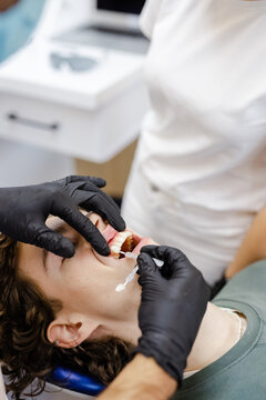 Anonymous cosmetic implant dental intervention teeth hygiene patient
