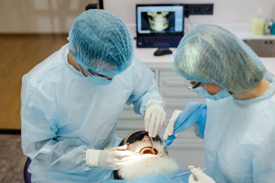Orthodontist team health dental surgical-treatment teeth clinic cure
