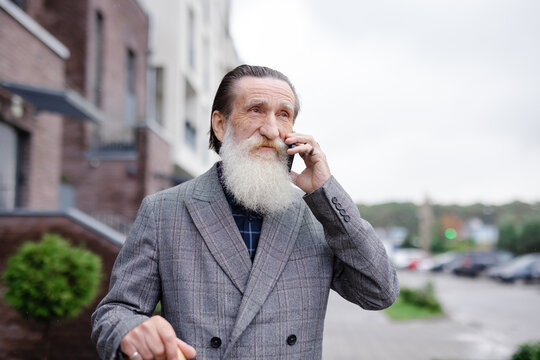 Aged call phone street gentleman business serious 