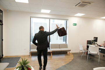 Business man leaving the office