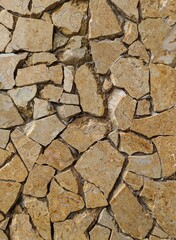 cutting of a stone slab from a beautiful mosaic of an important church in Brazil that can be used as a texture or wall background, with very intense colors in grey, orange, red, white and black.