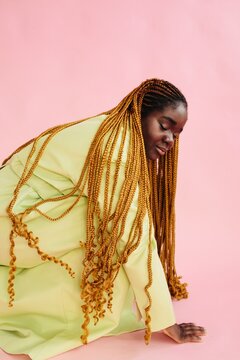 Woman With Braided Hair Studio Portrait