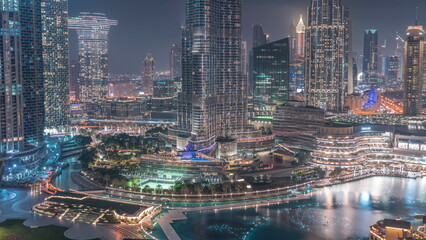 Aerial view of Dubai city day to night timelapse in downtown.
