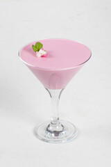 Pink tea matcha cream dessert, Pitaya Panna Cotta in martini glass. White background